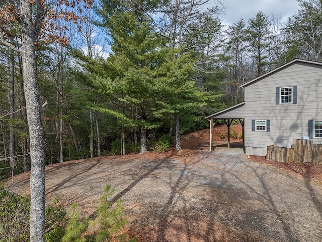 view of yard with a carport