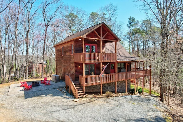 480 Sugar Mountain Rd, Blue Ridge, GA 30513 - view of front facade with a shingled roof and a wooden deck