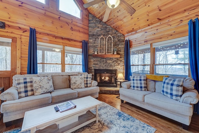 480 Sugar Mountain Rd, Blue Ridge, GA 30513 - living room with high vaulted ceiling, wooden ceiling, wood finished floors, a stone fireplace, and ceiling fan