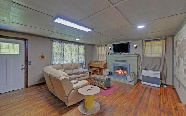 209 Vengeance Creek Rd, Marble, NC 28905 - living area with hardwood / wood-style floors, a fireplace, and plenty of natural light