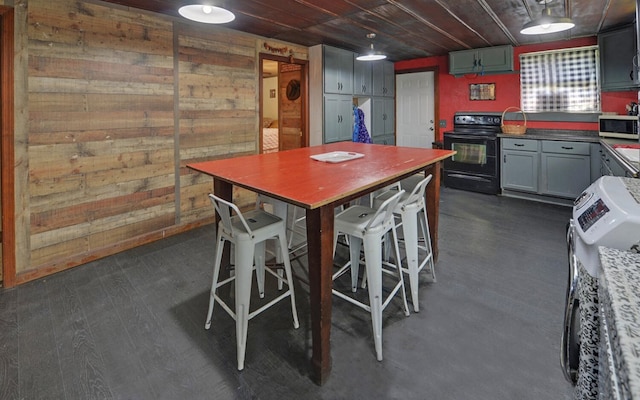 209 Vengeance Creek Rd, Marble, NC 28905 - kitchen featuring black / electric stove, dark wood-type flooring, wooden walls, and wooden ceiling