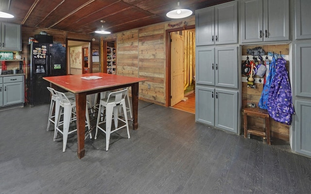 209 Vengeance Creek Rd, Marble, NC 28905 - kitchen featuring black fridge, wooden ceiling, dark wood-style floors, and gray cabinetry