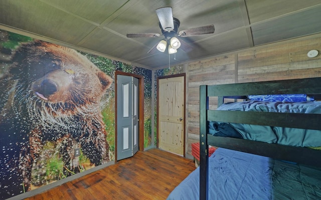 209 Vengeance Creek Rd, Marble, NC 28905 - bedroom featuring wood finished floors, a ceiling fan, and wood walls