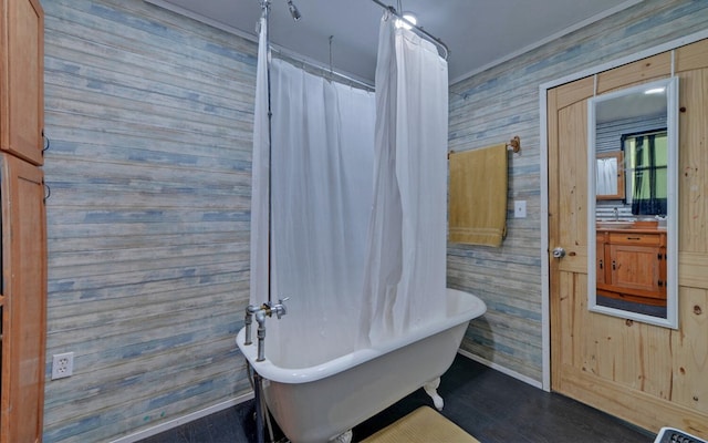 209 Vengeance Creek Rd, Marble, NC 28905 - full bathroom featuring baseboards, a freestanding bath, wooden walls, wood finished floors, and curtained shower