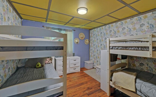 209 Vengeance Creek Rd, Marble, NC 28905 - bedroom with wallpapered walls and wood finished floors