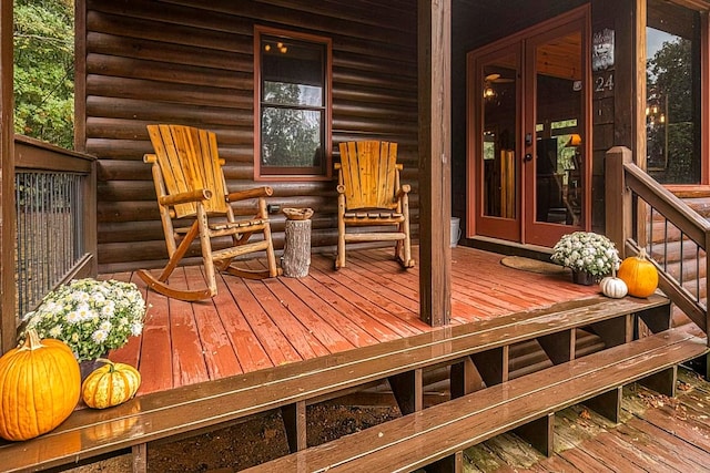 wooden terrace featuring french doors