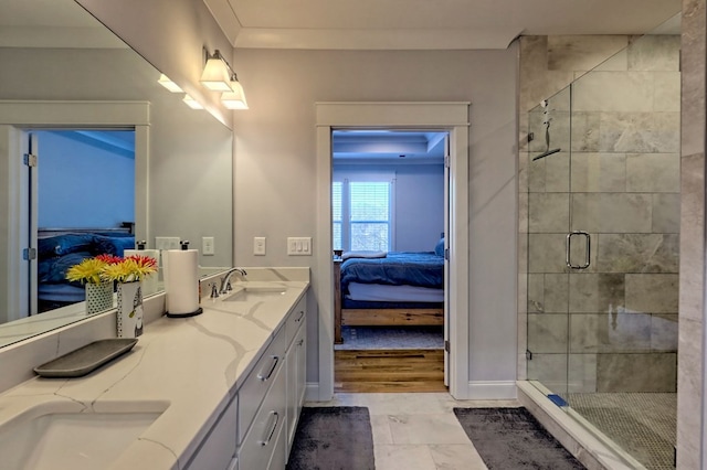 bathroom featuring vanity and a shower with shower door