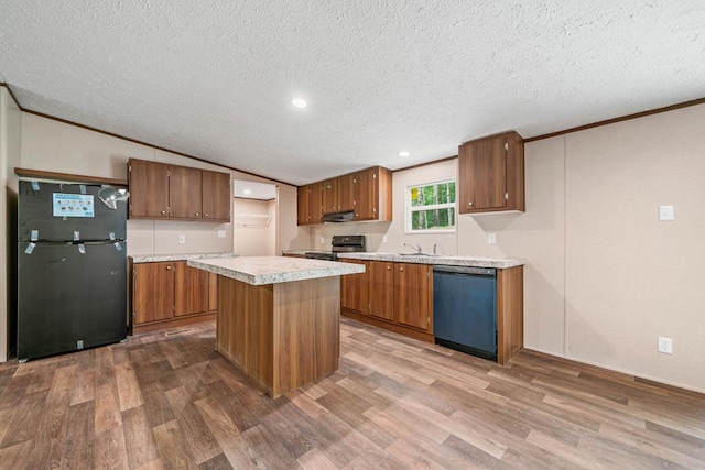 220 Jetty Dr, Ellijay, GA 30540 - kitchen featuring freestanding refrigerator, dishwasher, wood finished floors, light countertops, and crown molding