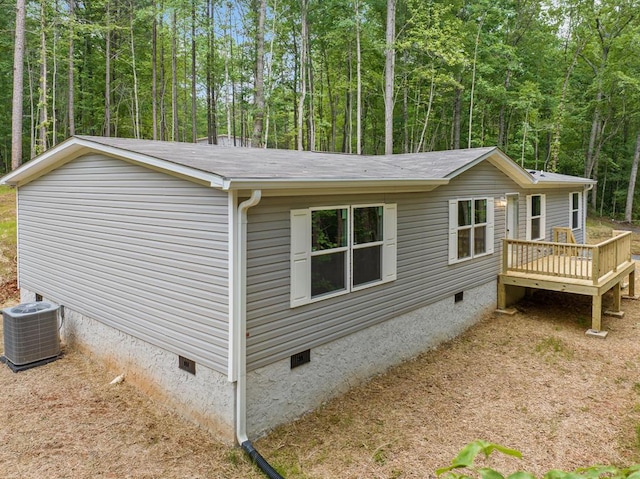 220 Jetty Dr, Ellijay, GA 30540 - view of side of property with crawl space, a wooden deck, a view of trees, and roof with shingles