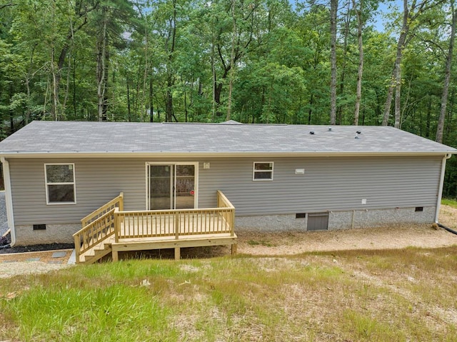 220 Jetty Dr, Ellijay, GA 30540 - rear view of property with crawl space, a wooden deck, roof with shingles, and a wooded view