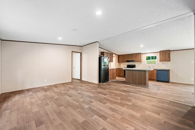 220 Jetty Dr, Ellijay, GA 30540 - kitchen with freestanding refrigerator, dishwasher, stove, open floor plan, and recessed lighting