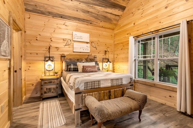 184 Rockhouse Rd, Cherry Log, GA 30522 - bedroom with lofted ceiling, wood finished floors, and wood walls