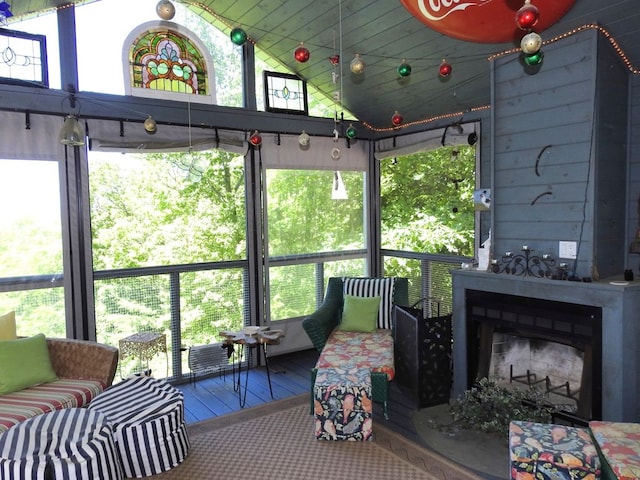 120 Sunrock Mountain Trc, Blue Ridge, GA 30513 - sunroom / solarium featuring a fireplace and vaulted ceiling