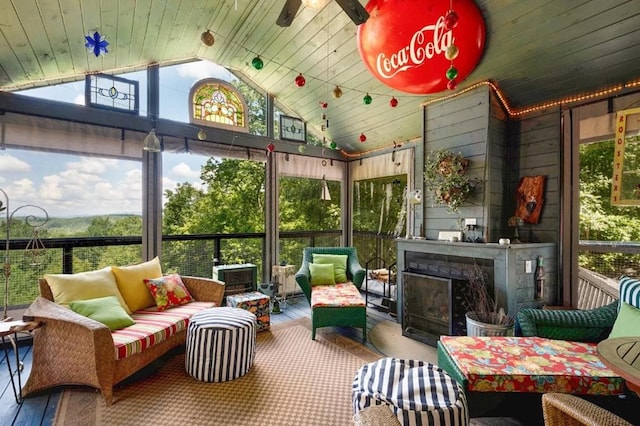 120 Sunrock Mountain Trc, Blue Ridge, GA 30513 - sunroom / solarium featuring an outdoor living space with a fireplace, lofted ceiling, and plenty of natural light