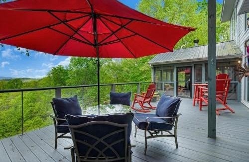 120 Sunrock Mountain Trc, Blue Ridge, GA 30513 - wooden deck featuring a sunroom