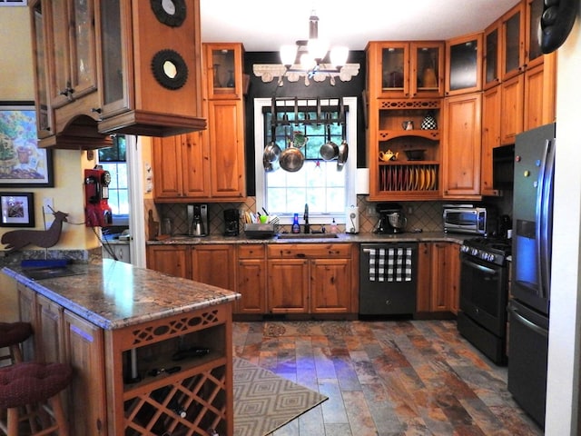 120 Sunrock Mountain Trc, Blue Ridge, GA 30513 - kitchen featuring dishwasher, gas range, brown cabinets, and a sink