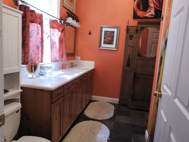 120 Sunrock Mountain Trc, Blue Ridge, GA 30513 - bathroom with toilet, vanity, plenty of natural light, and baseboards