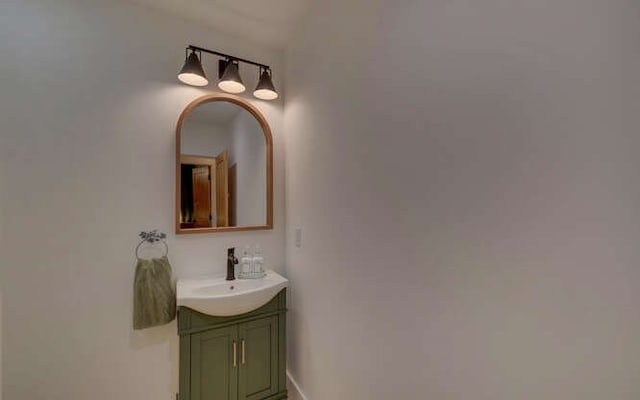 7670 Hiawassee Wilderness, Hiawassee, GA 30546 - bathroom with vanity and baseboards