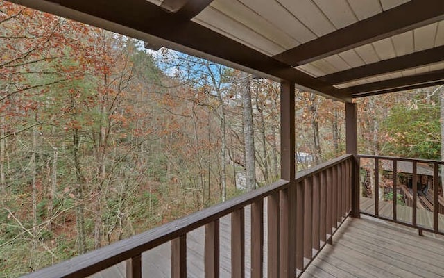 7670 Hiawassee Wilderness, Hiawassee, GA 30546 - wooden terrace featuring a view of trees