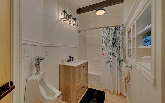 bathroom with vanity, beam ceiling, and shower / bath combination with curtain