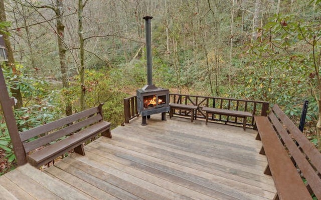 7670 Hiawassee Wilderness, Hiawassee, GA 30546 - wooden terrace featuring a wooded view