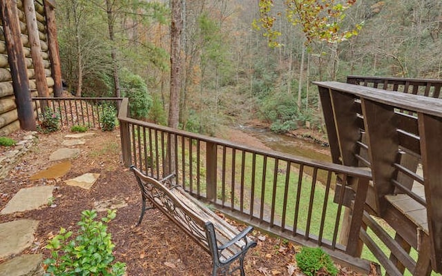 7670 Hiawassee Wilderness, Hiawassee, GA 30546 - wooden terrace featuring a forest view