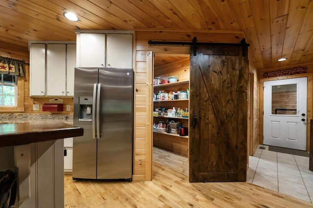 608 Pine Pass Cir, Mineral Bluff, GA 30559 - kitchen with stainless steel refrigerator with ice dispenser, wooden ceiling, white cabinets, light wood finished floors, and recessed lighting