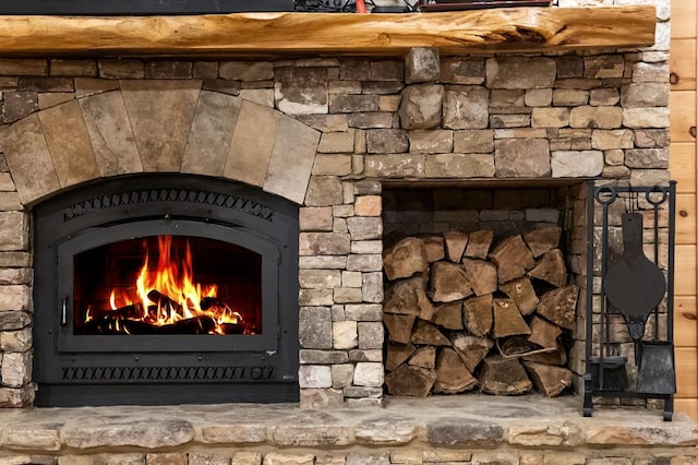 608 Pine Pass Cir, Mineral Bluff, GA 30559 - detailed view of a warm lit fireplace