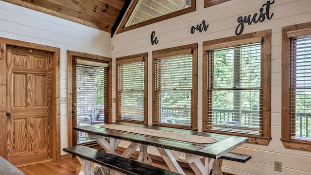 437 Spruce Cir, Mineral Bluff, GA 30559 - dining room featuring wooden ceiling, lofted ceiling, wood walls, and wood finished floors