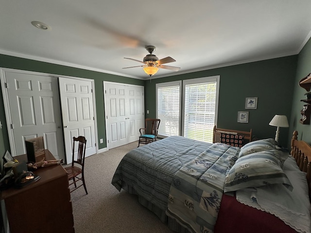 1207 Bullen Gap Rd, Blue Ridge, GA 30513 - bedroom featuring carpet, two closets, crown molding, a ceiling fan, and baseboards
