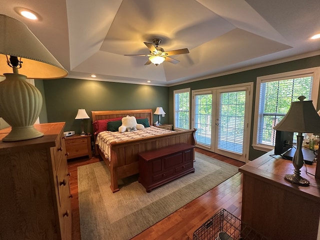 1207 Bullen Gap Rd, Blue Ridge, GA 30513 - bedroom featuring a tray ceiling, access to outside, light wood-style flooring, and ceiling fan