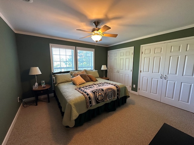 1207 Bullen Gap Rd, Blue Ridge, GA 30513 - bedroom featuring multiple closets, light carpet, crown molding, and baseboards