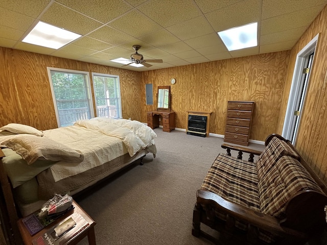 1207 Bullen Gap Rd, Blue Ridge, GA 30513 - bedroom featuring carpet flooring, a paneled ceiling, wood walls, a ceiling fan, and electric panel