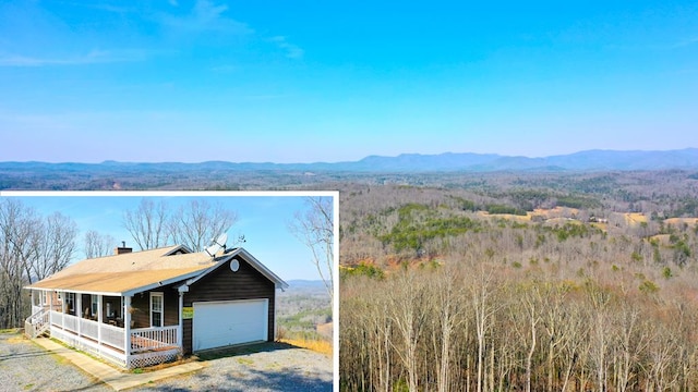 605 Hamby Rd, Murphy, NC 28906 - view of front of home featuring a porch, a mountain view, a chimney, and gravel driveway