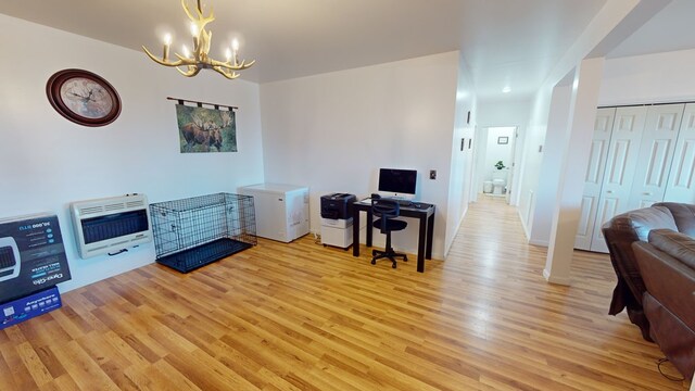 605 Hamby Rd, Murphy, NC 28906 - home office featuring heating unit, a chandelier, and light wood-style flooring