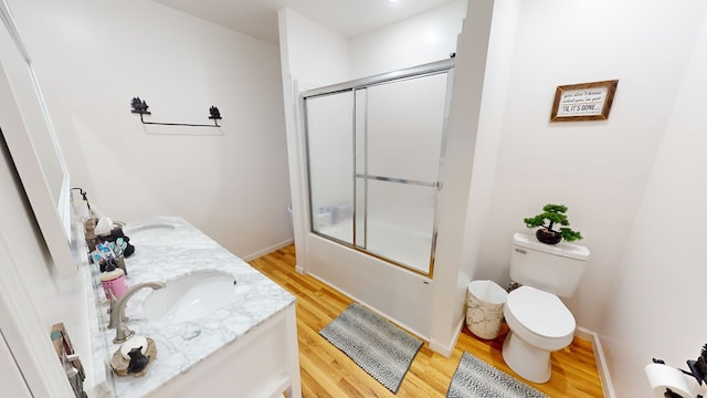 605 Hamby Rd, Murphy, NC 28906 - bathroom featuring wood finished floors, double vanity, and shower / bath combination with glass door