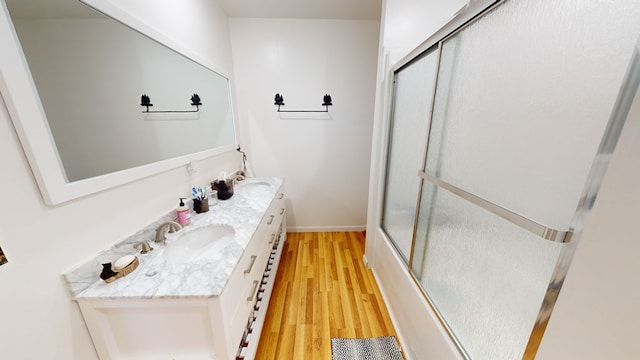 605 Hamby Rd, Murphy, NC 28906 - full bathroom with double vanity, an enclosed shower, and wood finished floors