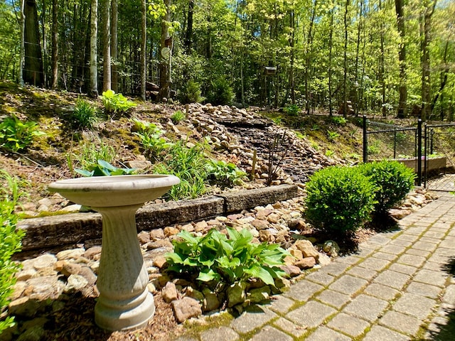 view of yard with a gate and fence