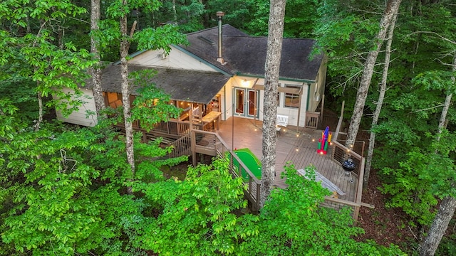 rear view of property with a deck