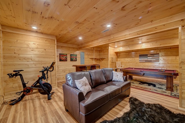 recreation room with light hardwood / wood-style floors, pool table, wood ceiling, and wooden walls