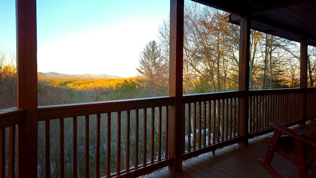 deck at dusk with a mountain view