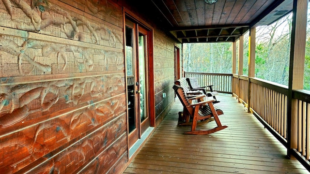 sunroom with wood ceiling