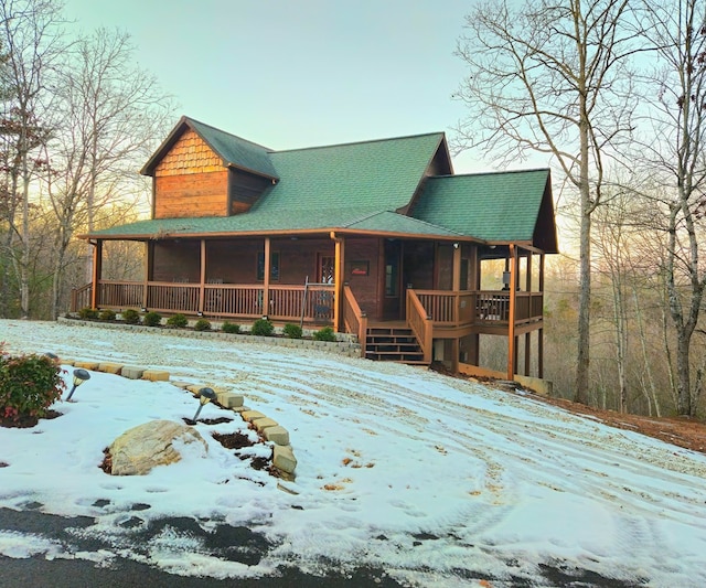 view of front facade with a sunroom