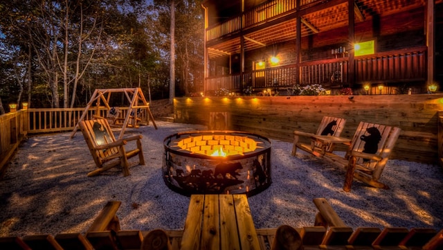 view of patio featuring an outdoor fire pit