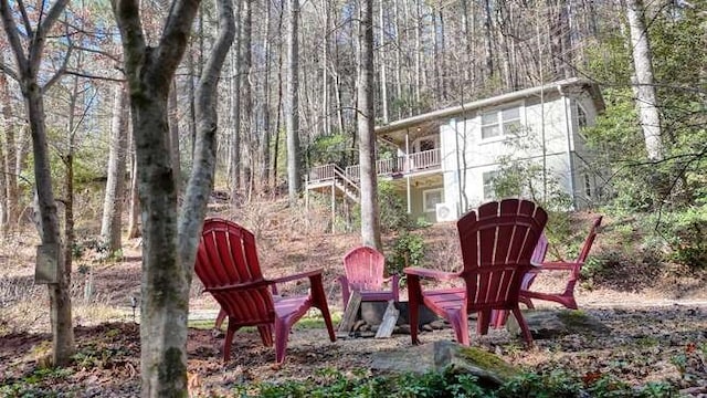 view of outdoor structure with a view of trees