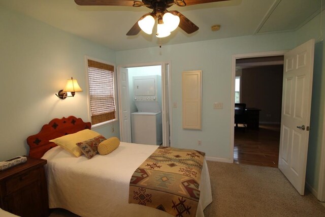140 Hannel Dr, Murphy, NC 28906 - carpeted bedroom featuring baseboards, attic access, ceiling fan, and stacked washer / dryer
