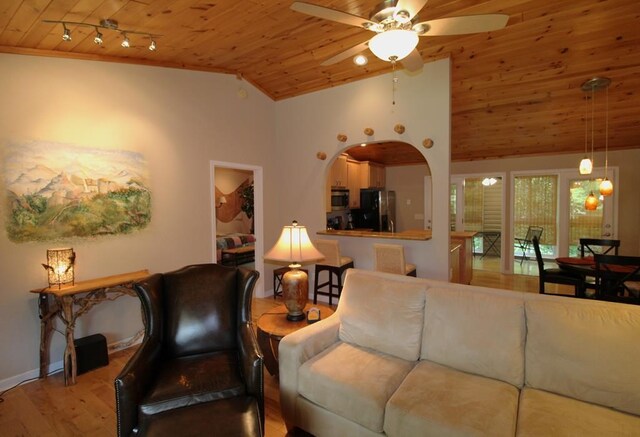 140 Hannel Dr, Murphy, NC 28906 - living area featuring ceiling fan, arched walkways, wood finished floors, lofted ceiling, and wood ceiling