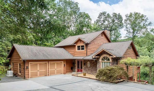 craftsman-style house featuring a garage