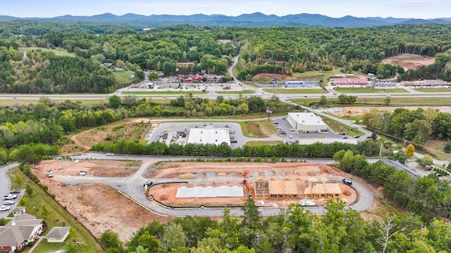 drone / aerial view featuring a mountain view