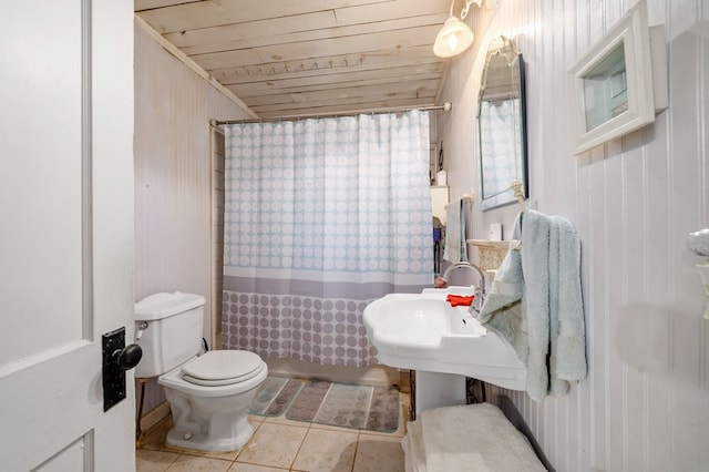 full bathroom with wood ceiling, sink, tile patterned flooring, toilet, and shower / bathtub combination with curtain